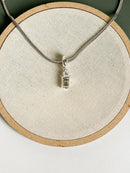 Berloque de Latão de Leite